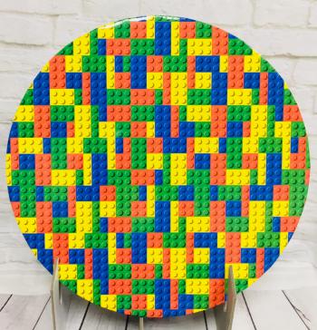 Podkład okrągły pod tort, ciasto (średnica: 25 cm, grubość: 1 cm), wzór Lego - Podkłady Cukiernicze Julita